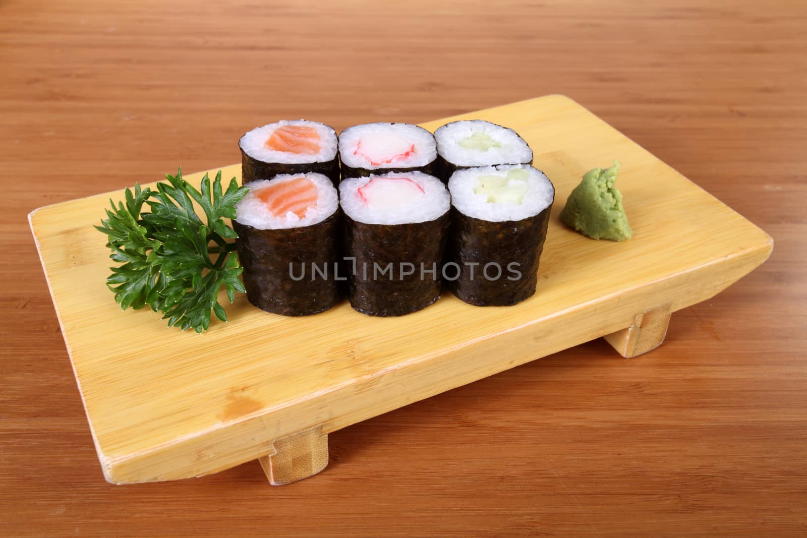 tray of sushi with wasabi