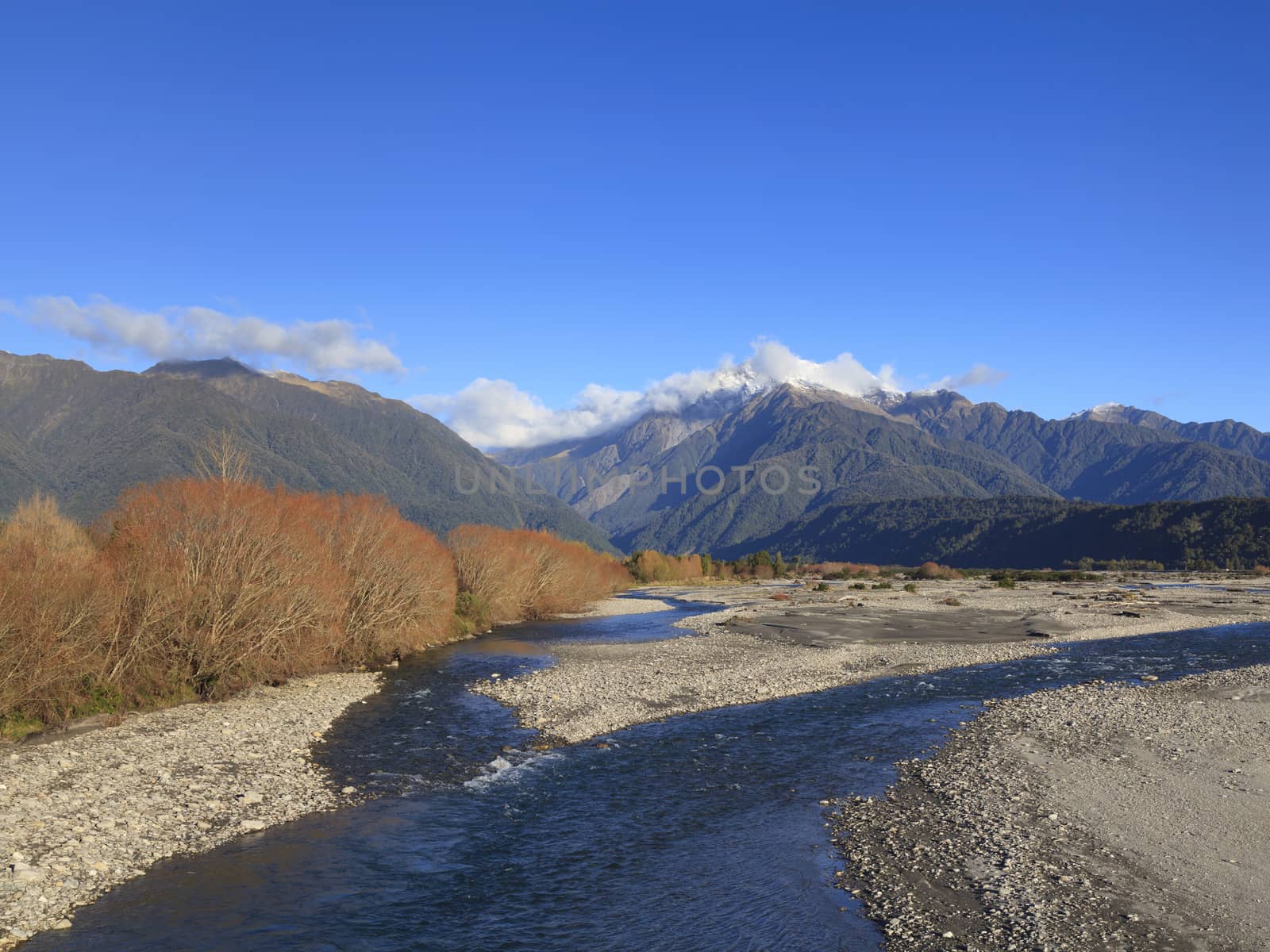 Poerua River and the Southern Alps, West Coast, South Island, New Zealand.