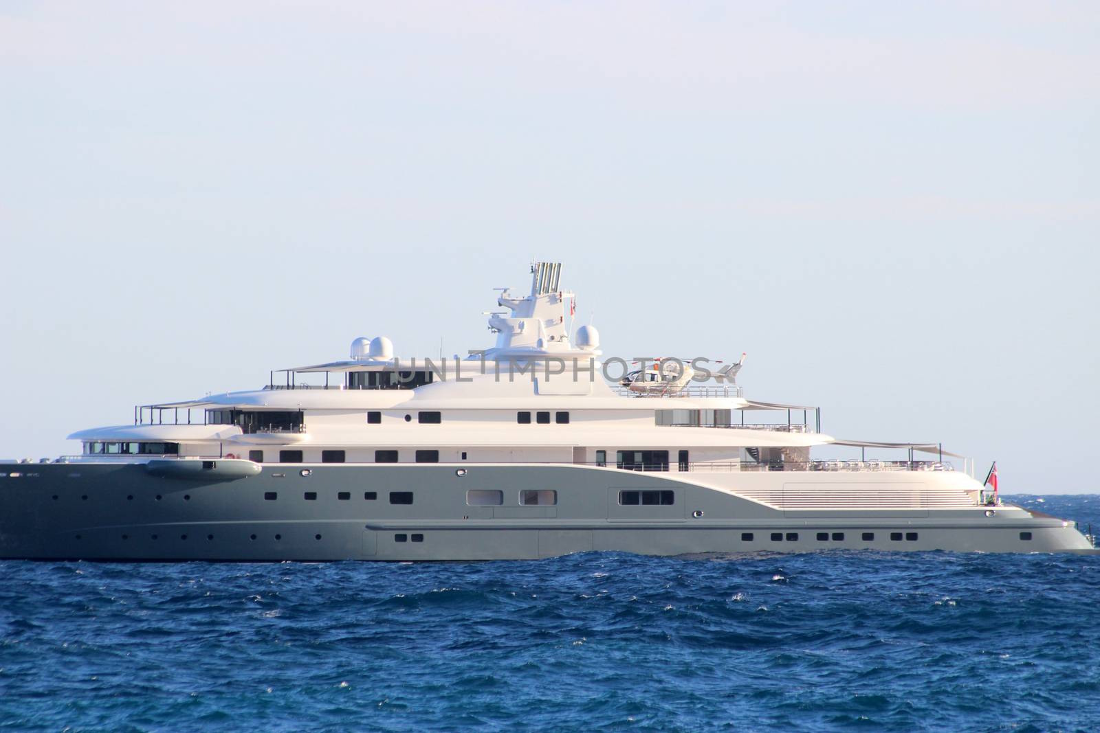 Luxury yacht with Helicopter on the Back Side View in Monaco