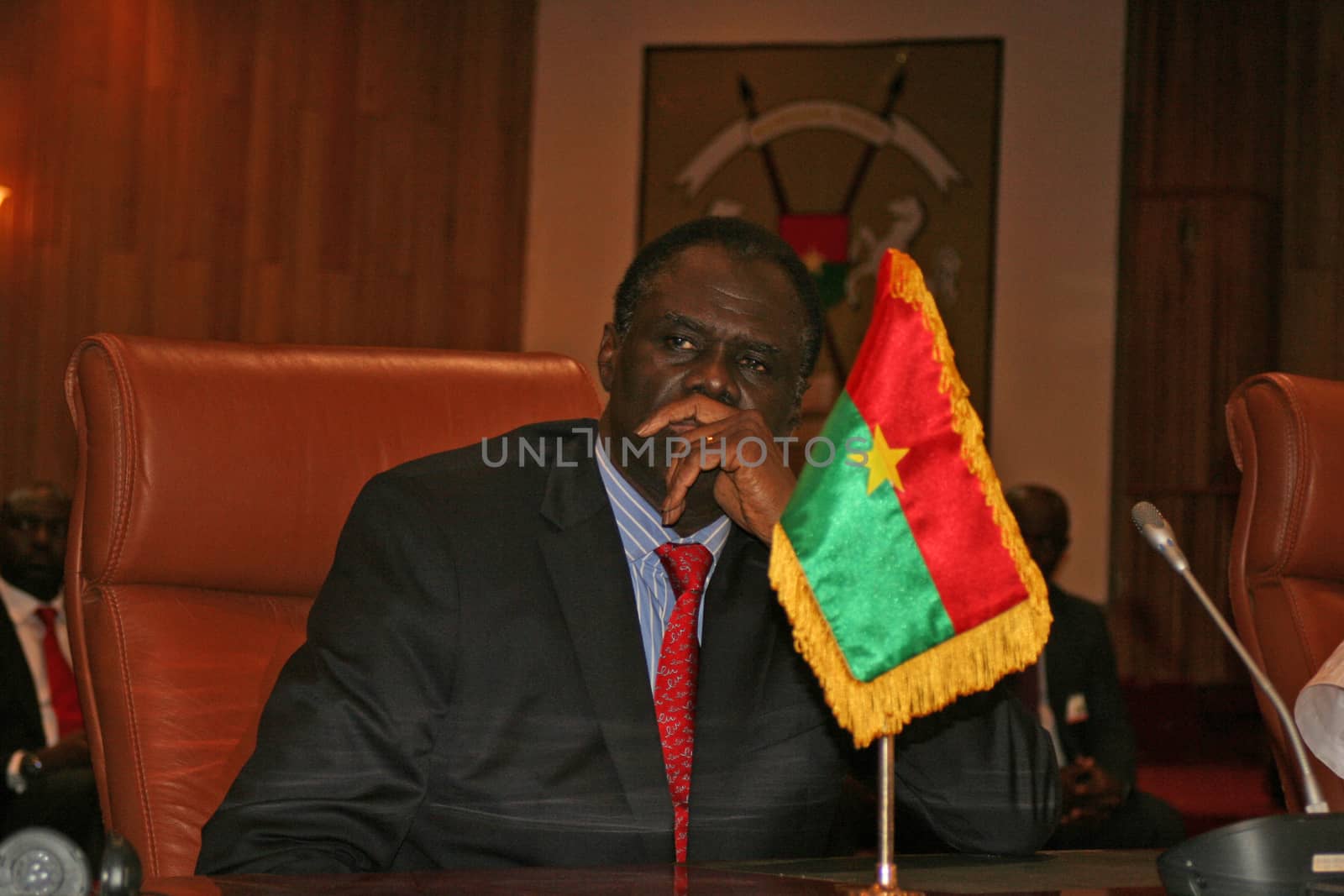 BURKINA FASO, Ouagadougou : Burkina Faso's interim president Michel Kafando delivers a speech as part of post-coup talks in Burkina Faso on September 23, 2015 in Ouagadougou. Burkina Faso's interim leader Michel Kafando was officially restored to power at a ceremony attended by regional heads of state on Wednesday, a week after a coup by an elite army unit. 