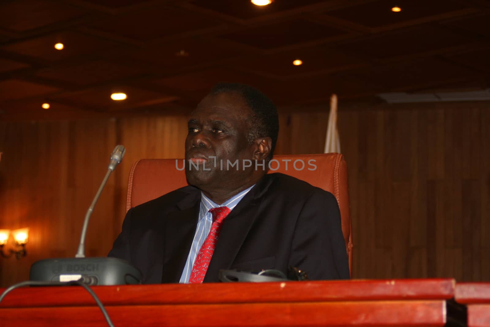 BURKINA FASO, Ouagadougou : Burkina Faso's interim president Michel Kafando delivers a speech as part of post-coup talks in Burkina Faso on September 23, 2015 in Ouagadougou. Burkina Faso's interim leader Michel Kafando was officially restored to power at a ceremony attended by regional heads of state on Wednesday, a week after a coup by an elite army unit. 