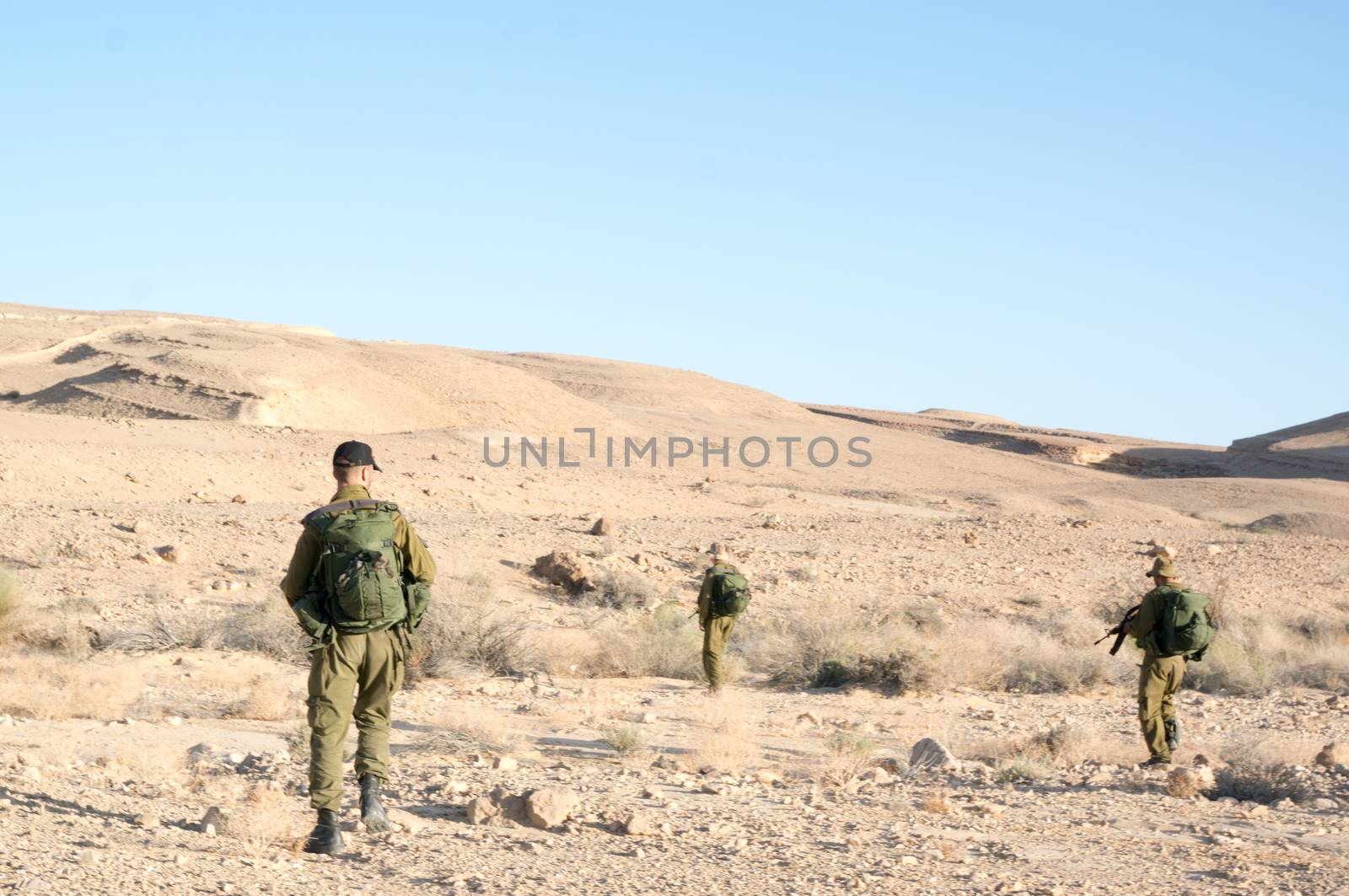Soldiers patrol in desert by javax