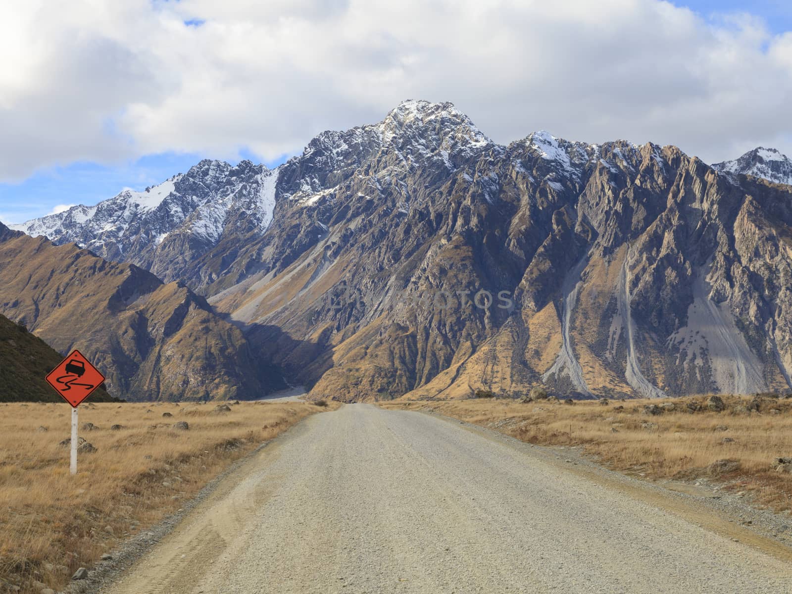 Gravel road leading to Tasman Valley in Aoraki Mount Cook National Park, Canterbury region, South Island, New Zealand.