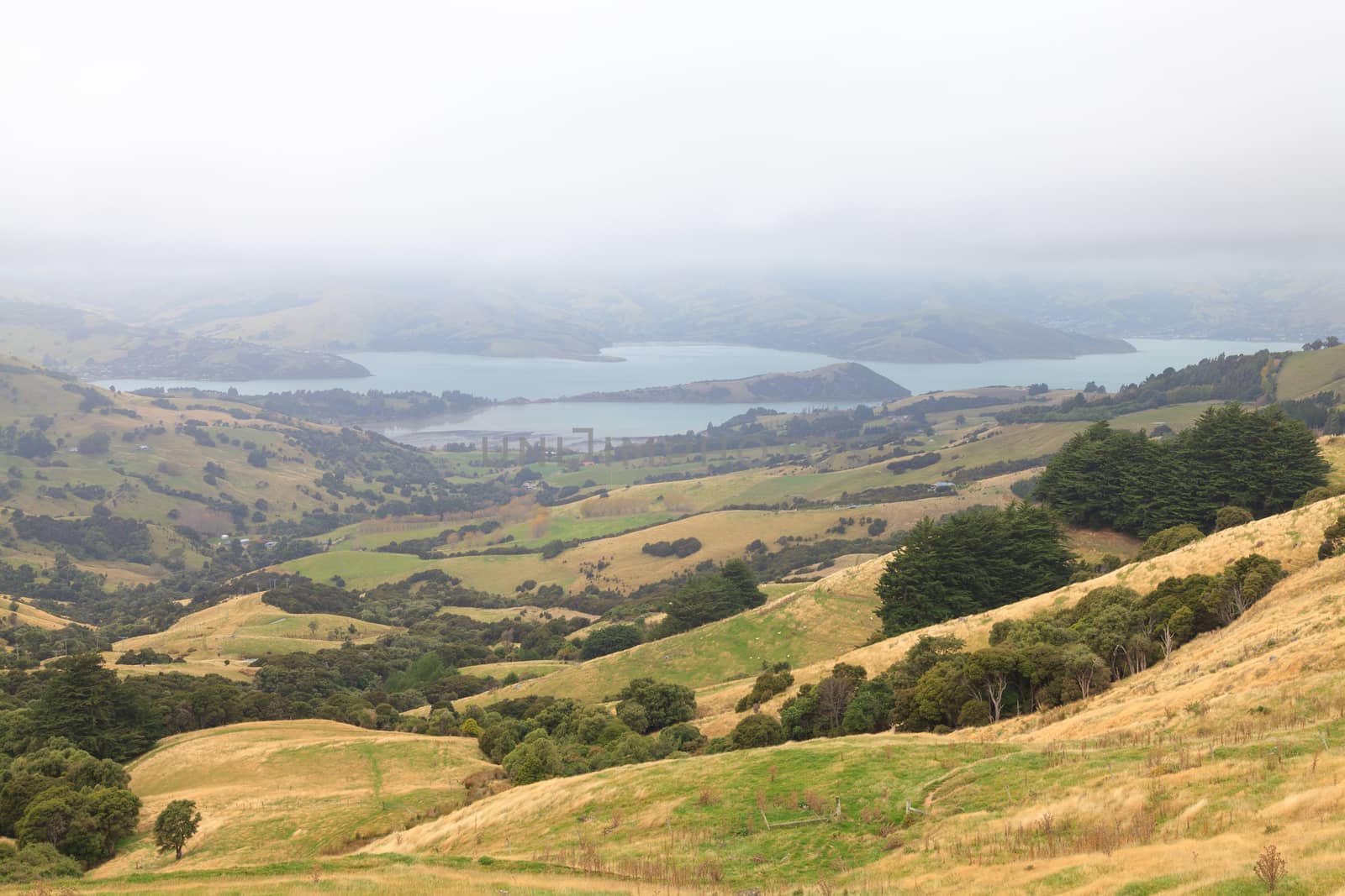 View of the coastline around Akaroa harbour, Canterbury region, South Island of New Zealand.