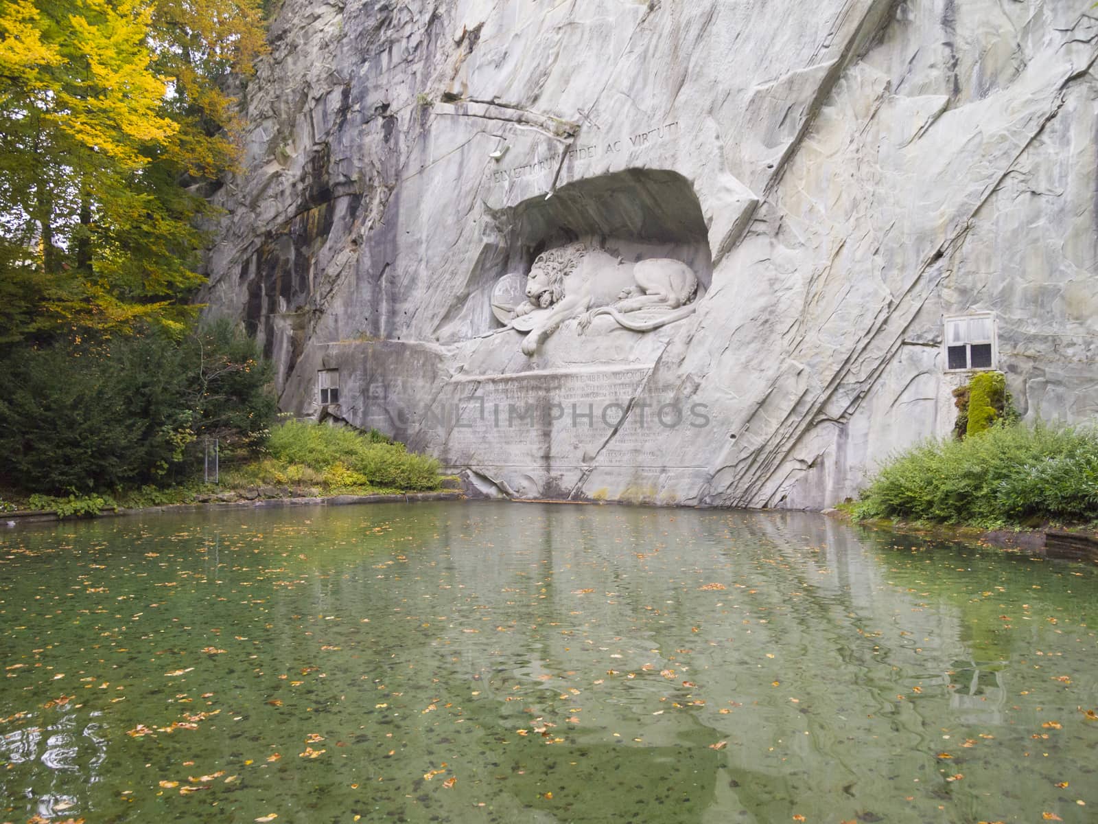 The Dying Lion Monument or the Lion of Lucerne. A historic landmark sculpture in Lucerne, Switzerland that commemorates the Swiss Guards who were massacred in 1792 during the French Revolution.