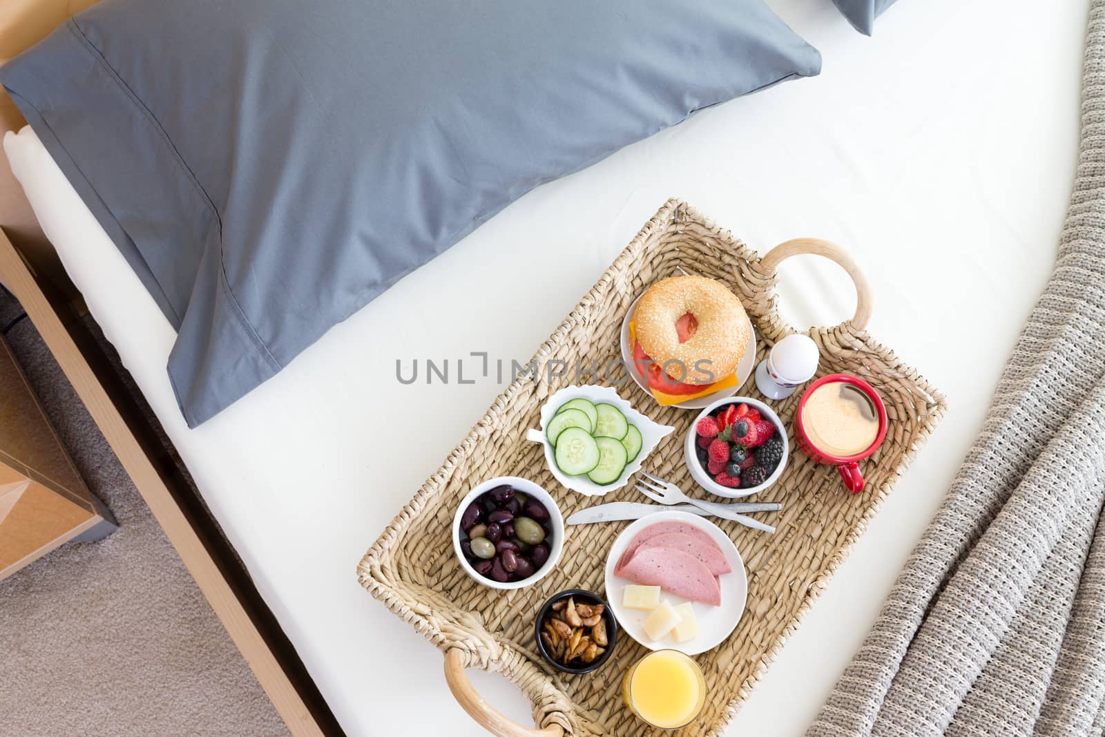 High Angle View of Breakfast Tray on Unmade Bed by coskun