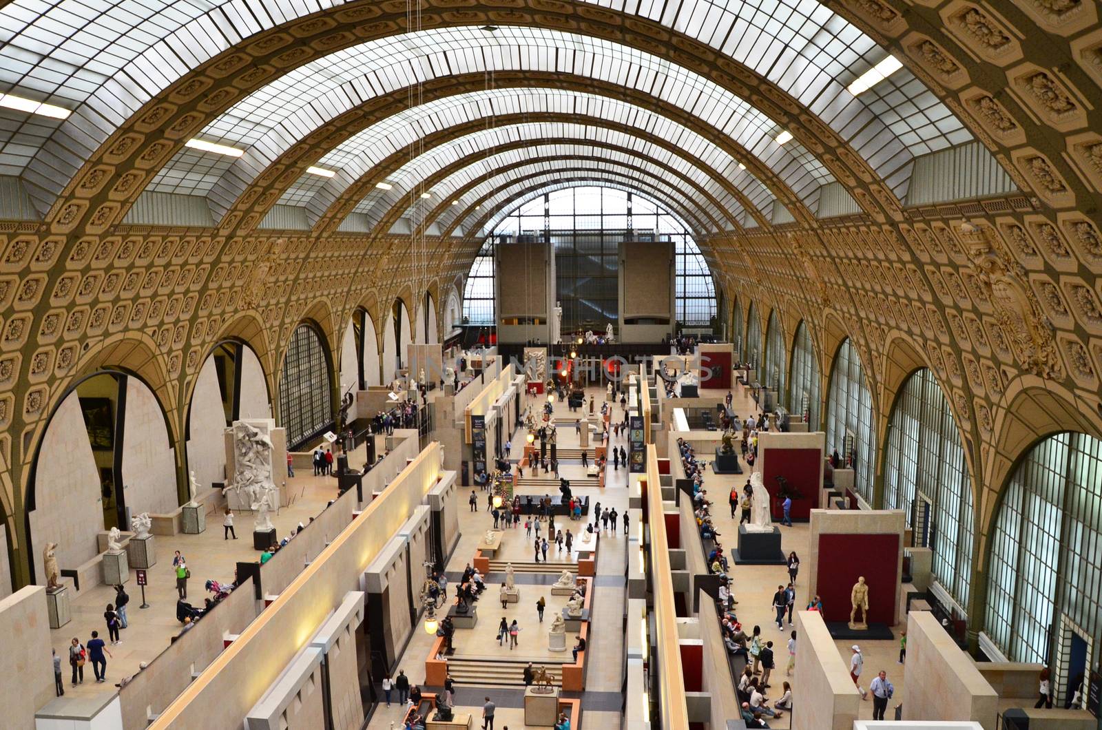 Paris, France - May 14, 2015: Visitors in the Musee d'Orsay in Paris, France. on May 14, 2015, The museum houses the largest collection of impressionist and post-impressionist masterpieces in the world.