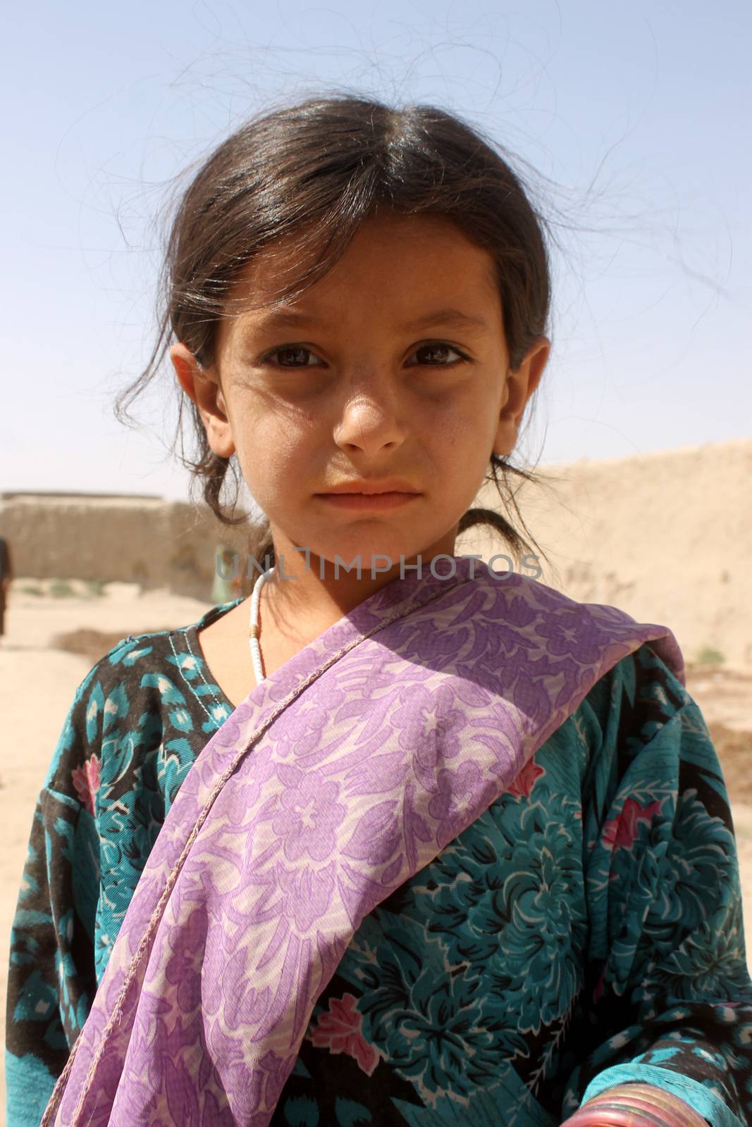 AFGHANISTAN, Kandahar: Tens of thousands of children in Kandahar don't attend school, due to a shortage of teachers and school buildings, the cost of schooling, and the cultural beliefs around education for girls. These photos capture children not in school who play on the streets or care for siblings, as well as some of the lucky ones who are being educated. Pictures taken on September 11, 2015. All children have parental permission to be photographed. 