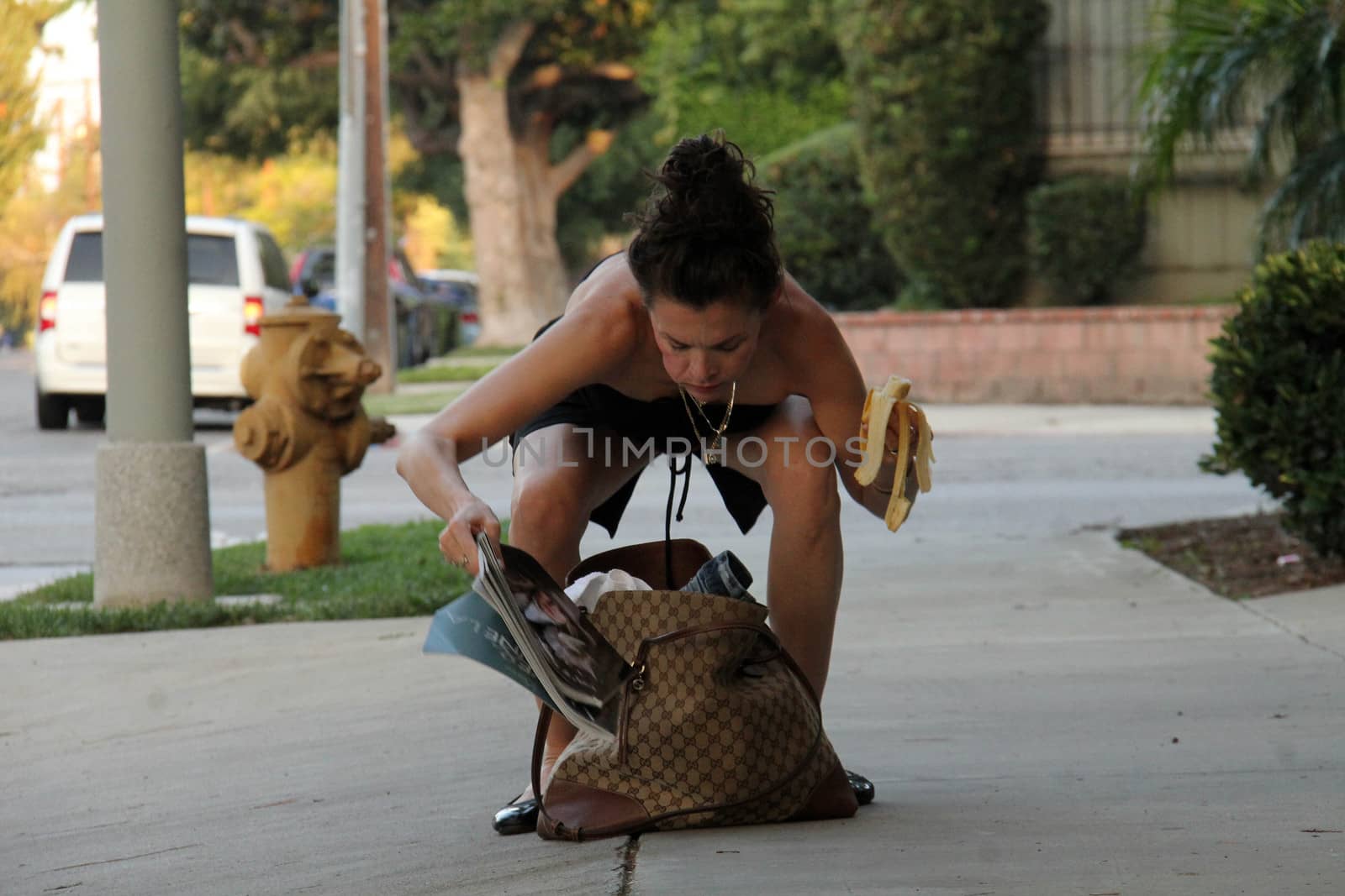 Alicia Arden
star of "Hoarding: Buried Alive," has both a purse malfunction and a wardrobe malfunction while leaving yoga class, Woodland Hills, CA 09-23-15/ImageCollect by ImageCollect