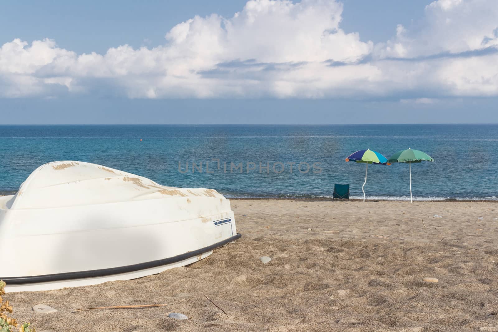 White boat on the beach by alanstix64