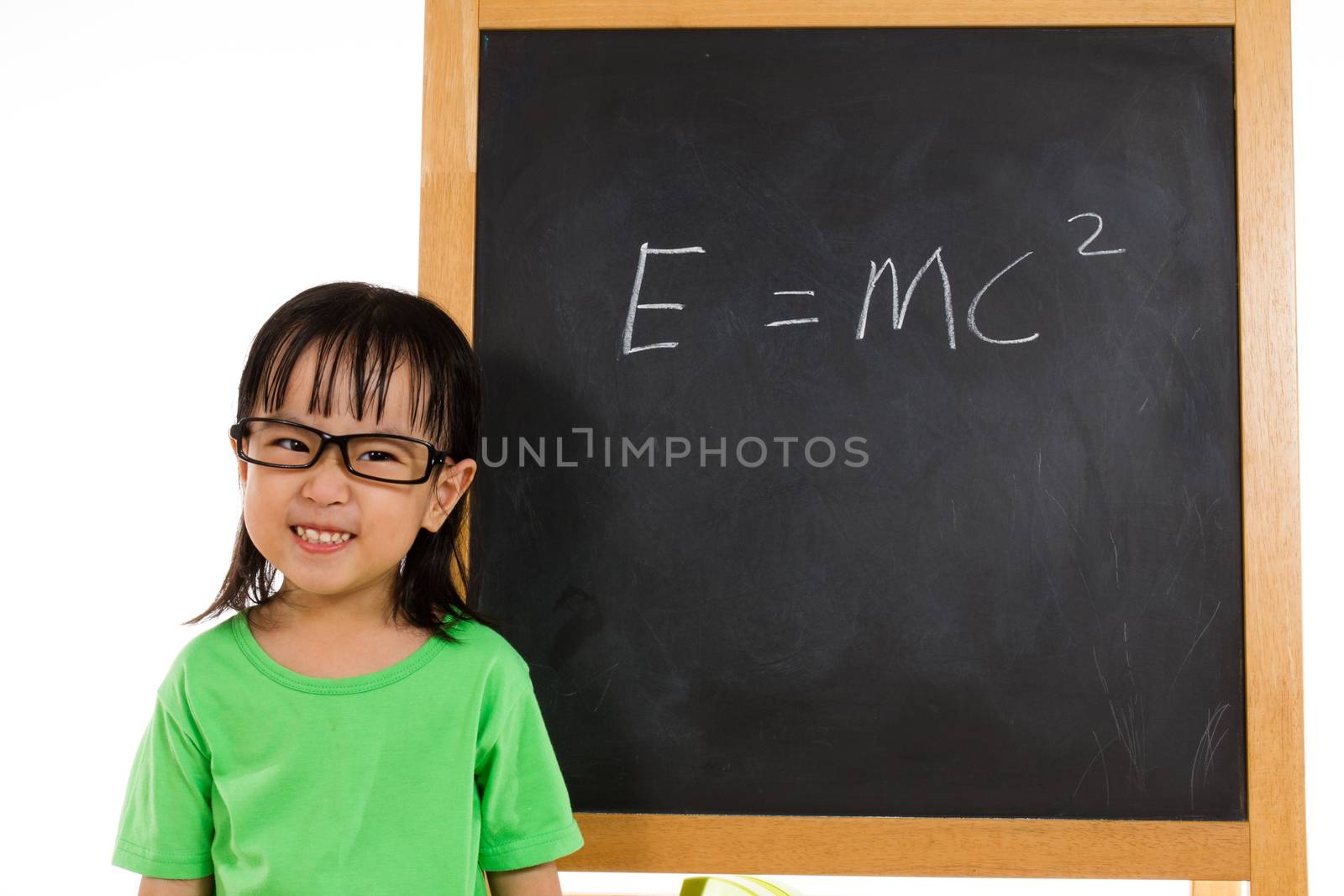 Asian Chinese little girl againts blackboard with formulas by kiankhoon