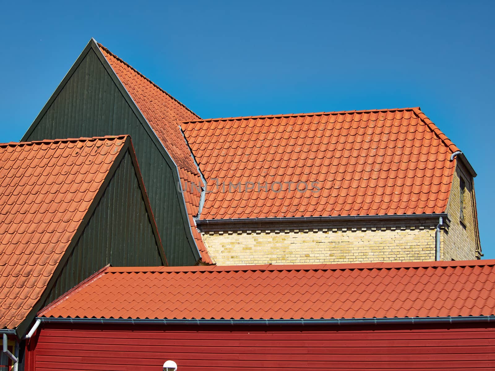 Traditional old classic style Danish house with summer clear blue sky Assens Denmark 
