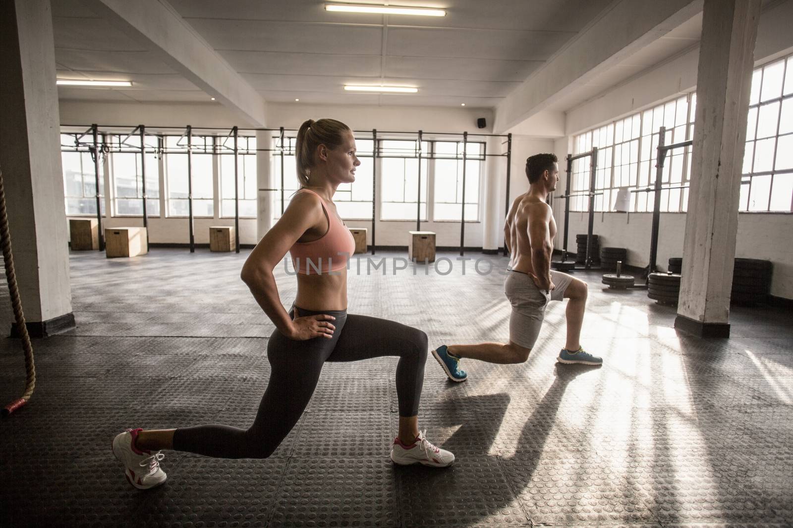 Two fit people doing fitness by Wavebreakmedia