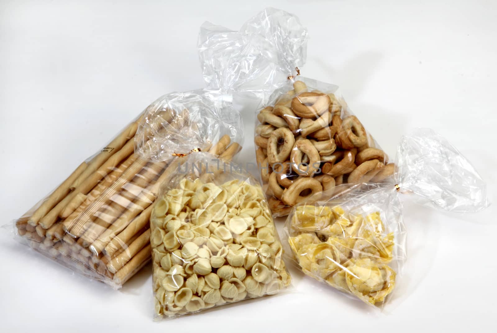 breadsticks, biscuits and pasta preserved in cellophane bags for food