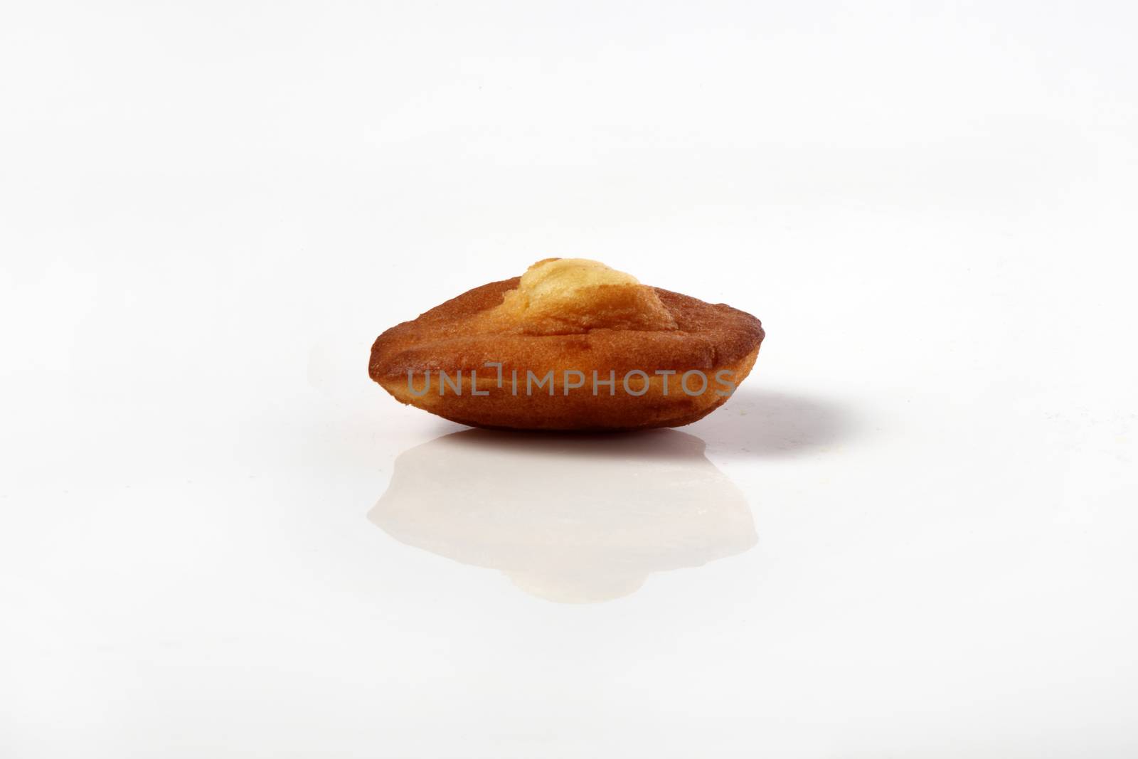 madeleine on white glossy background