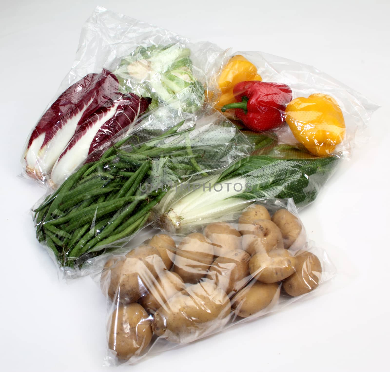 vegetables conserved in cellophane bags for food