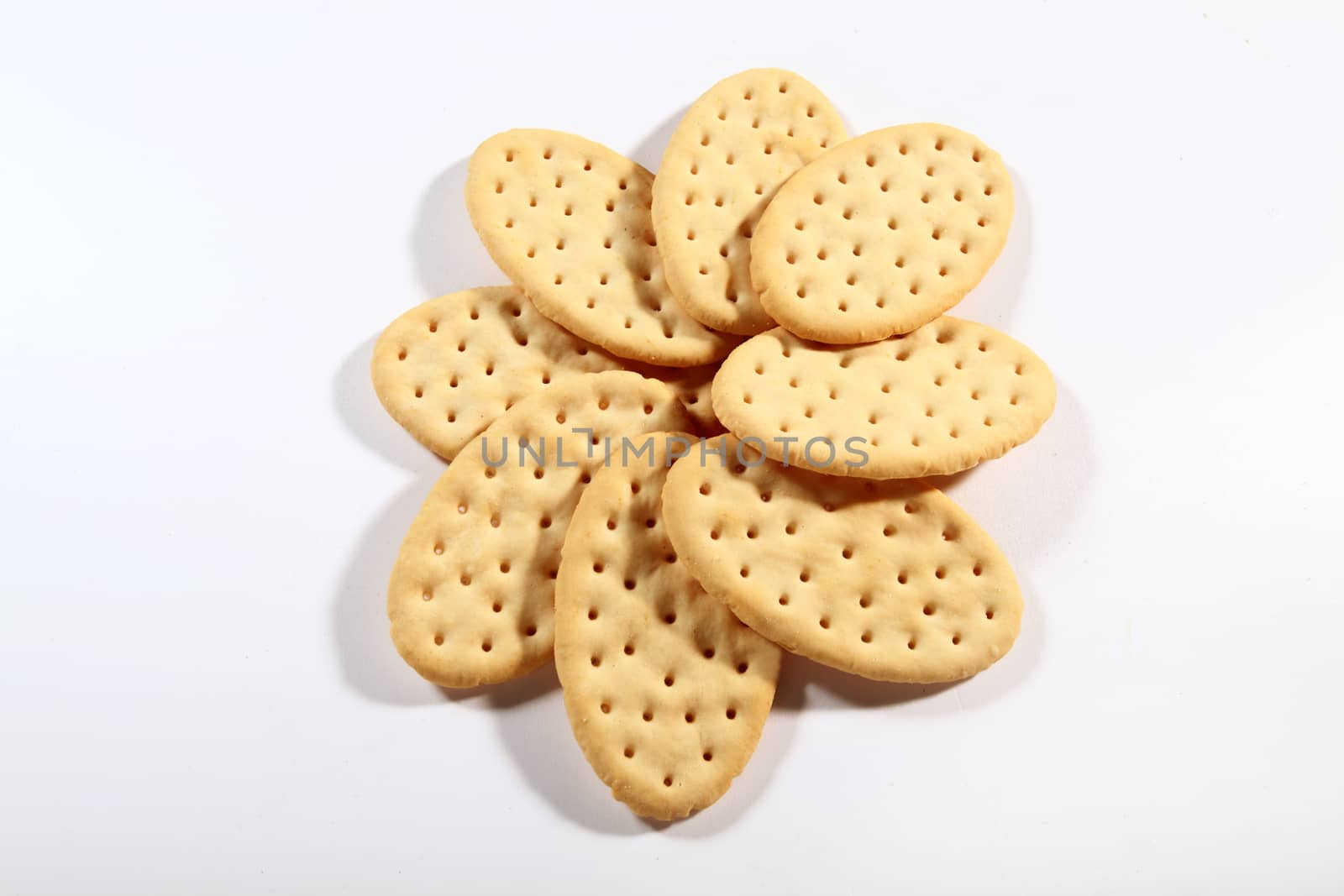 group of crackers shaped like a flower on a white background