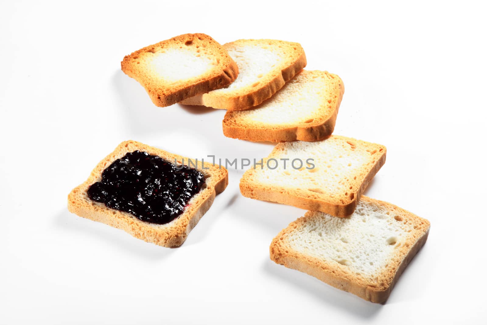 group biscuits with jam on white background