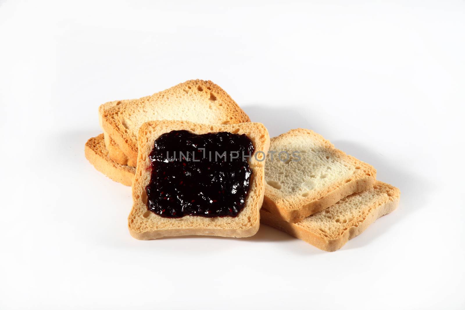 group biscuits with jam on white background