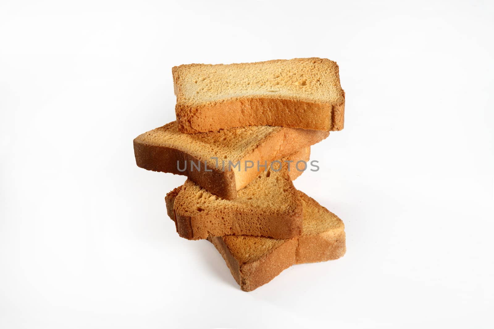 four slices toast viewed from above on a neutral background