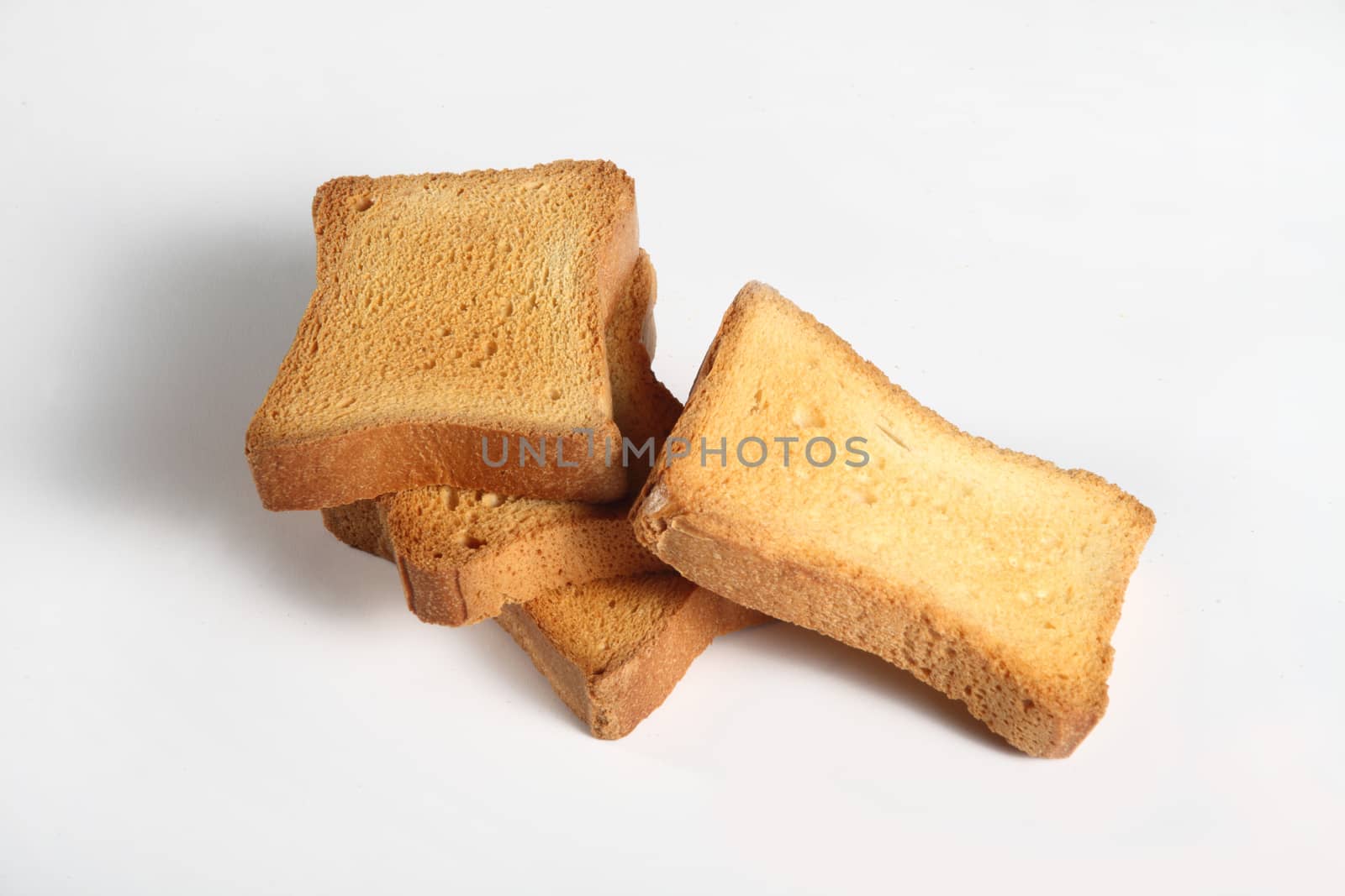 four slices toast viewed from above on a white background