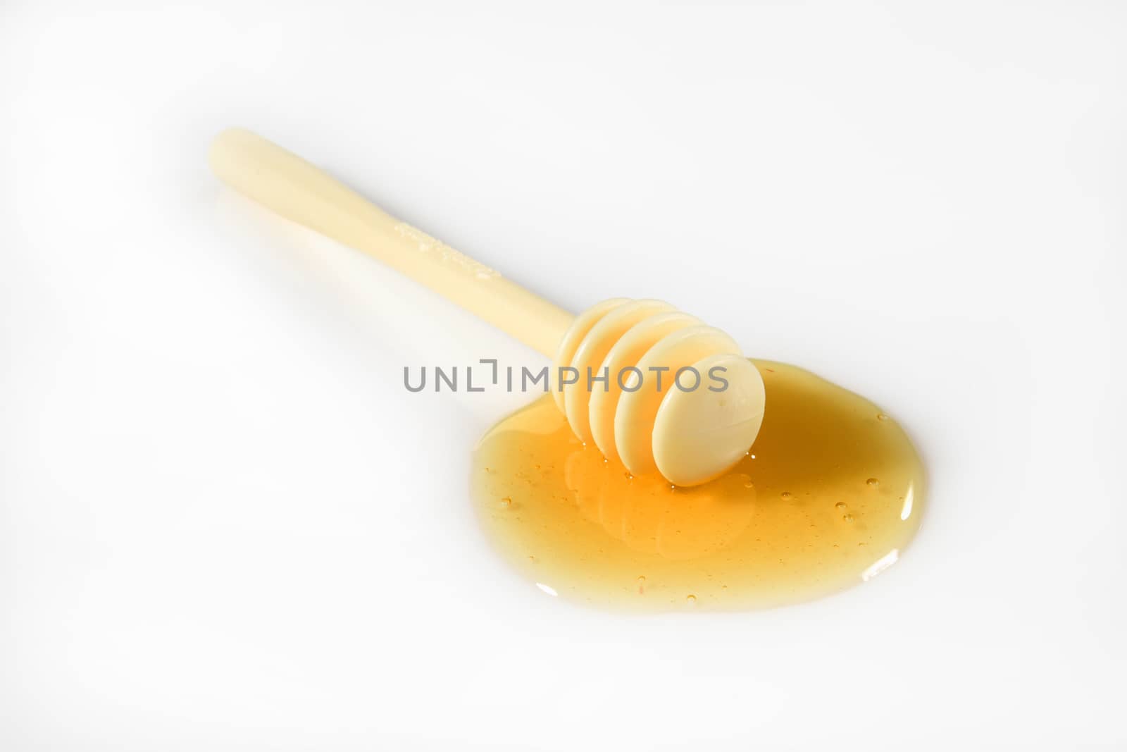 honey on white by diecidodici