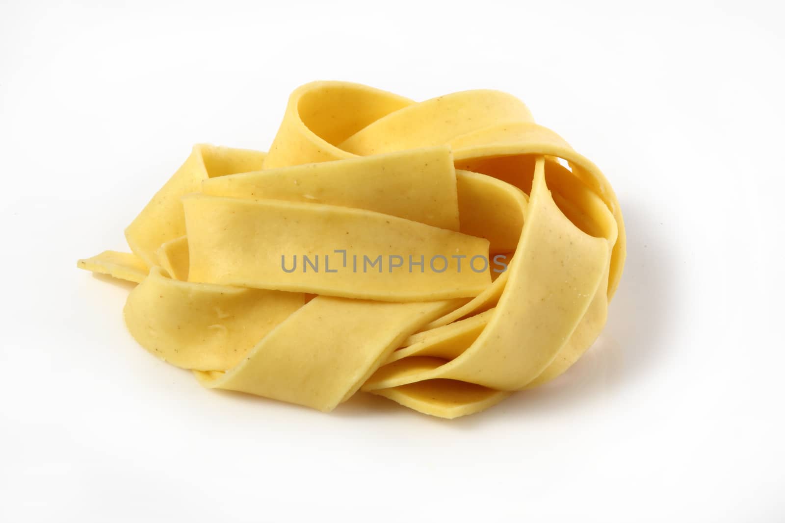 fresh italian pasta on white background