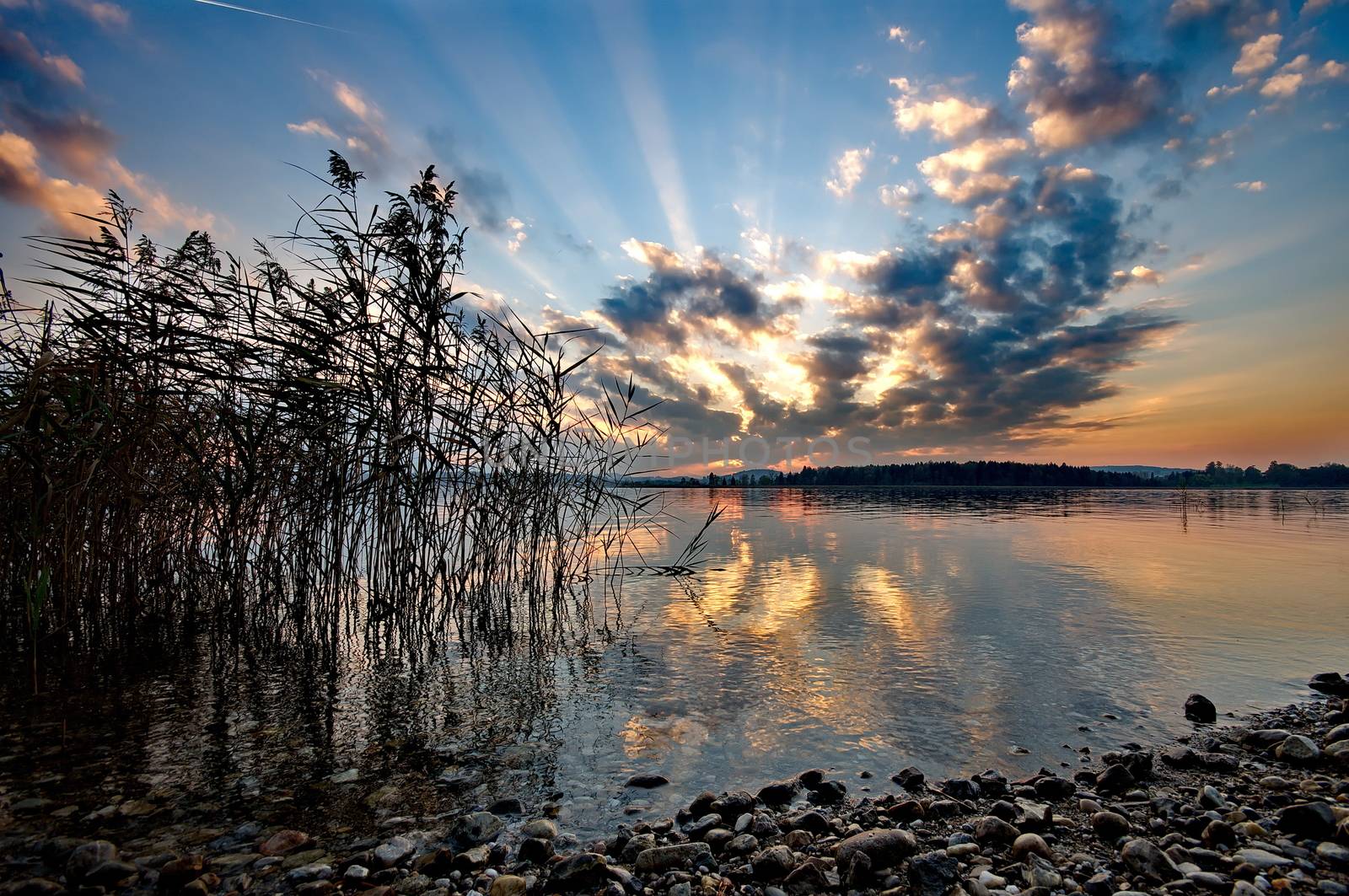 Sunset at lake Chiemsee in Germany by anderm