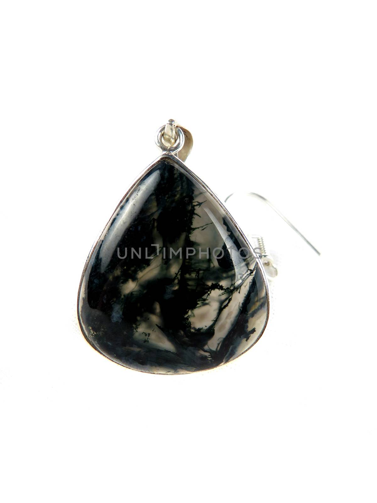 A precious gemstone pendant made of silver, on white studio background.                               