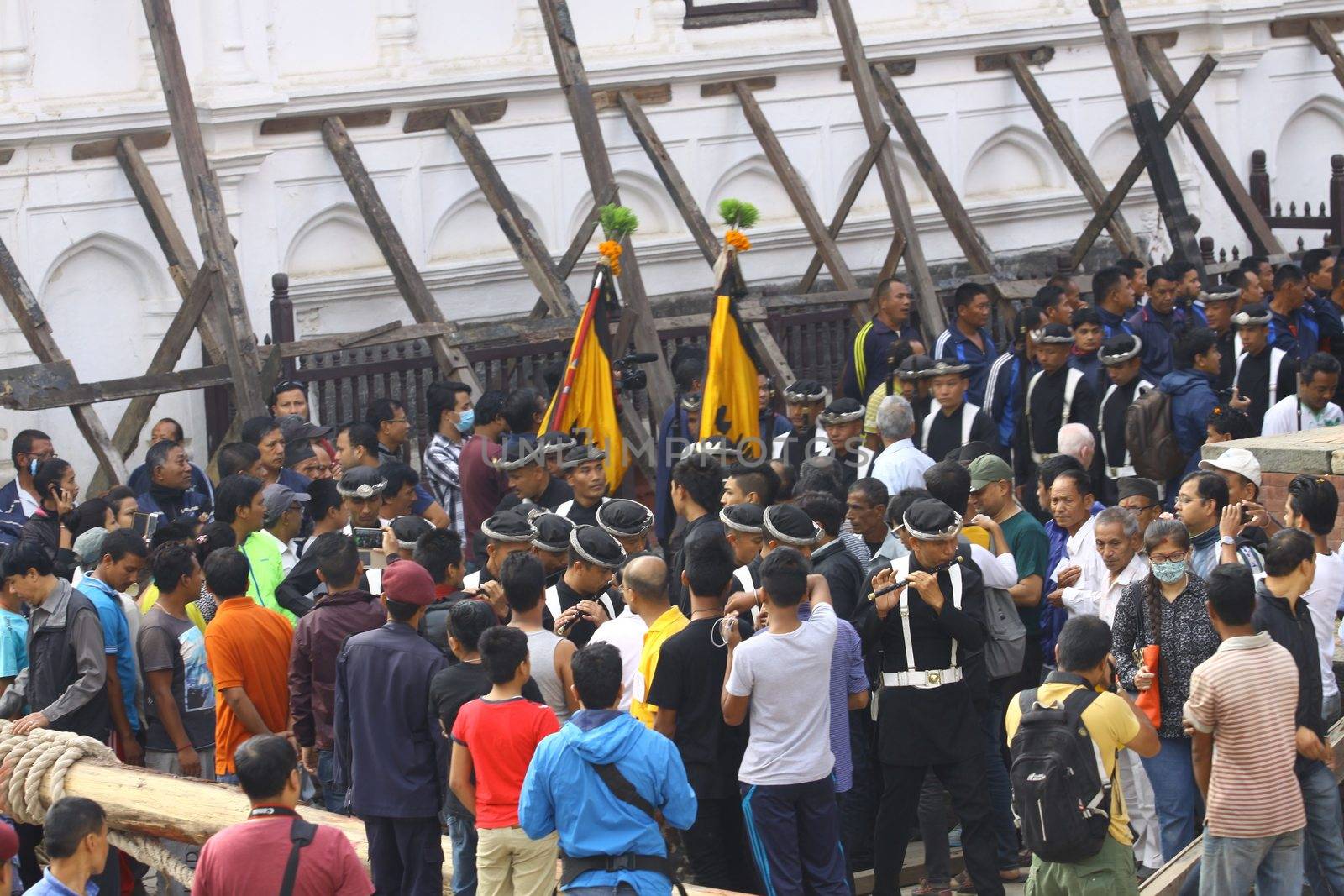 NEPAL, Kathmandu:  	The erection of a wooden Indradhoj pole in Hanumandhoka�Durbar Square on September 25, 2015 marked the beginning of Indrajatra festival in Kathmandu, Nepal.  	Indrajatra is an eight day festival with a chariot procession dedicated to Goddess Kumari, Lord Ganesh and Bhairav, as well as worshiping Indra, the king of gods. 