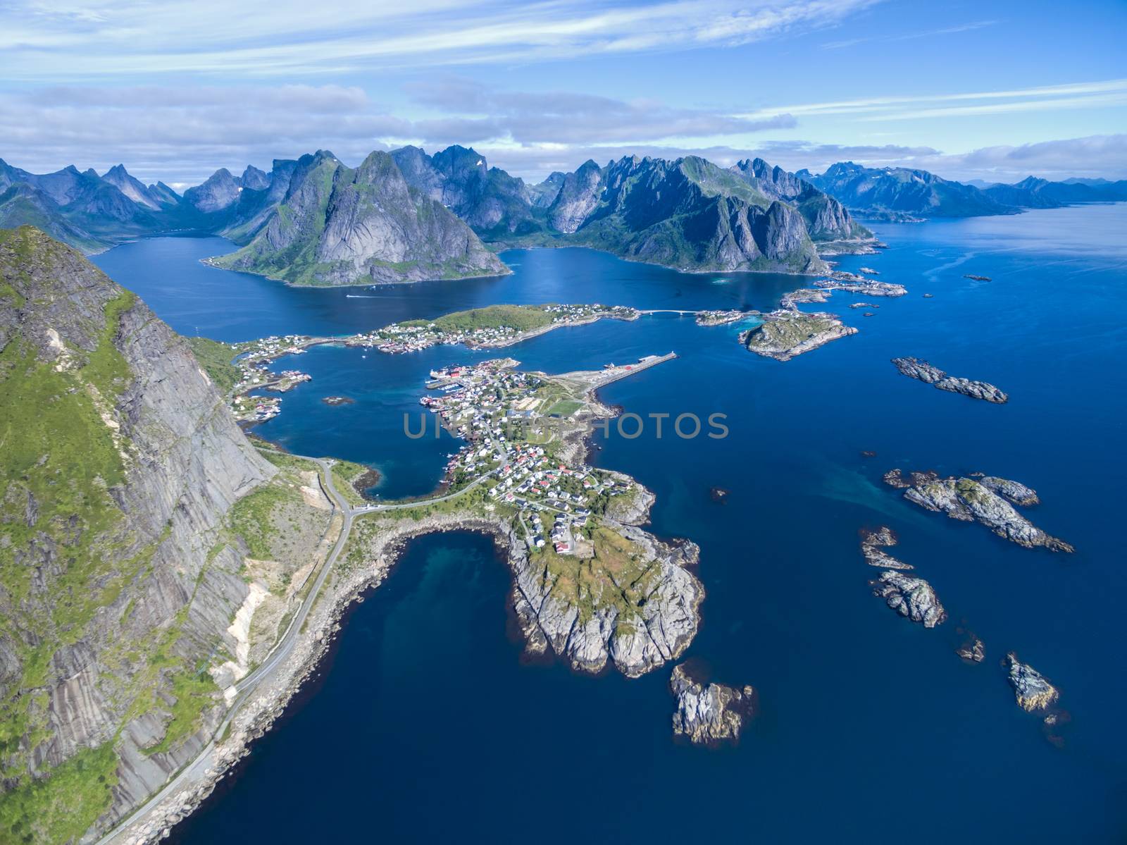 Reine surrounded by deep fjords and magnificient peaks on Lofoten islands in Norway