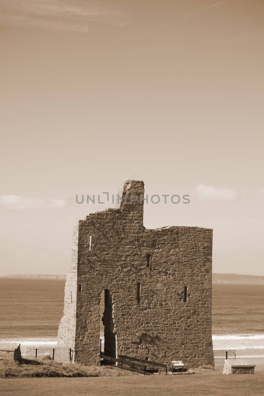 ballybunion castle ruins in sepia by morrbyte