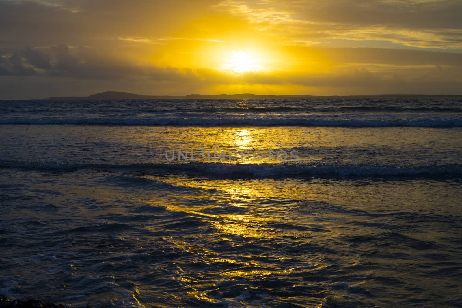 beal beach near ballybunion on the wild atlantic way ireland with an orange sunset