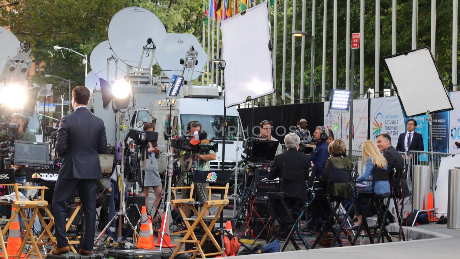 UNITED STATES, New York: Television news crews broadcast near the United Nations headquarters in New York City ahead of the address by Pope Francis at the United Nations, September 25, 2015. 