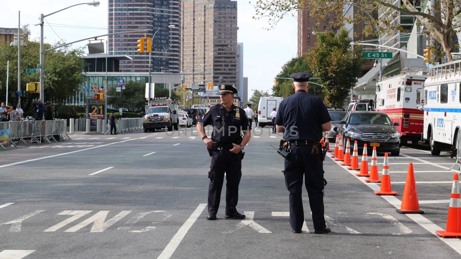 UNITED STATES, New York: Police officers stand guard near the United Nations headquarters in New York City ahead of the address by Pope Francis at the United Nations, September 25, 2015. 
