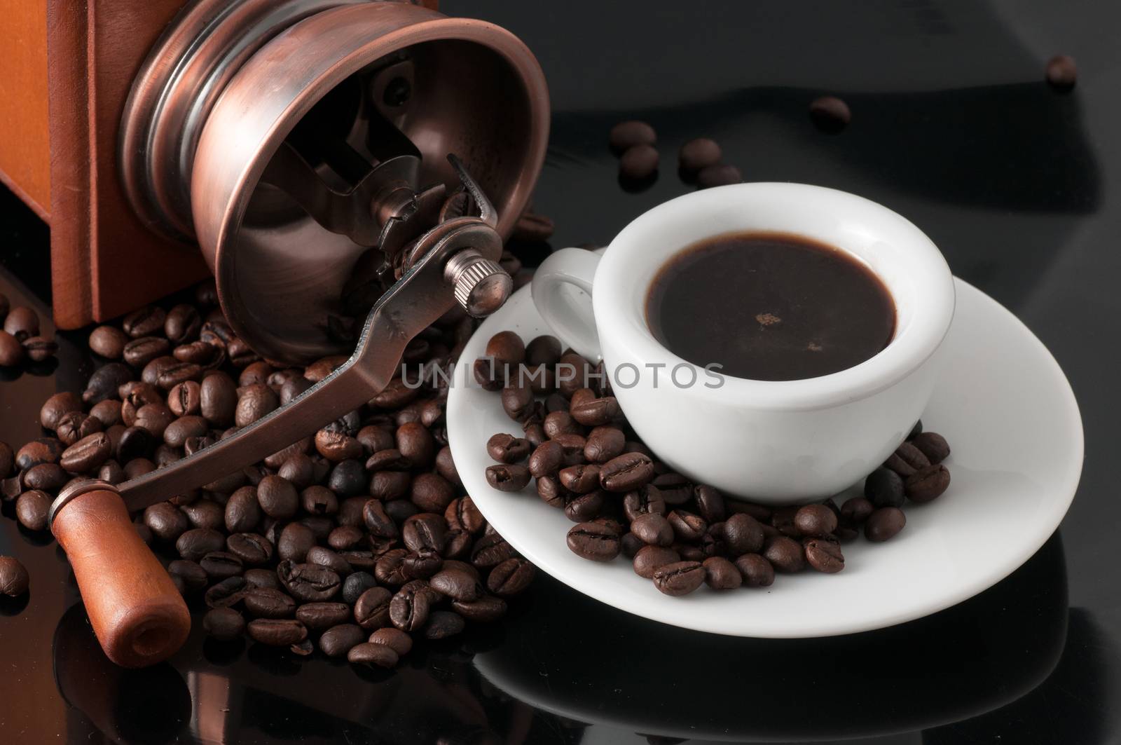 white cup with old Neapolitan grinder coffee by antonio.li