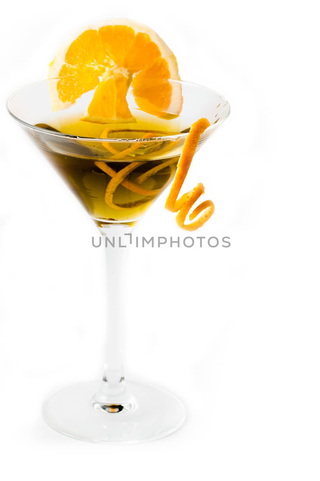 glass of alcoholic drink cocktail with orange slices and cubes on white background