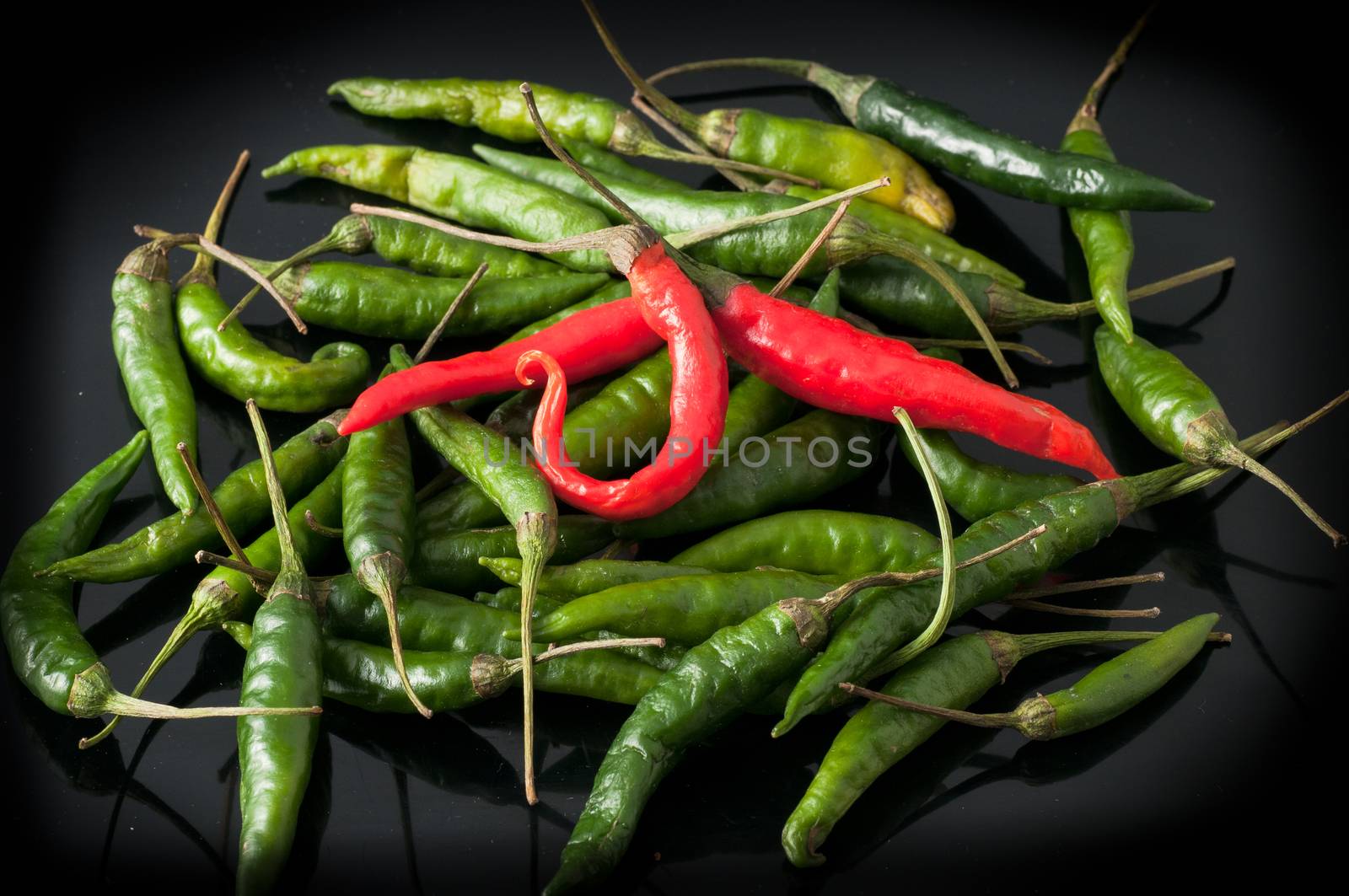 green chili peppers and red