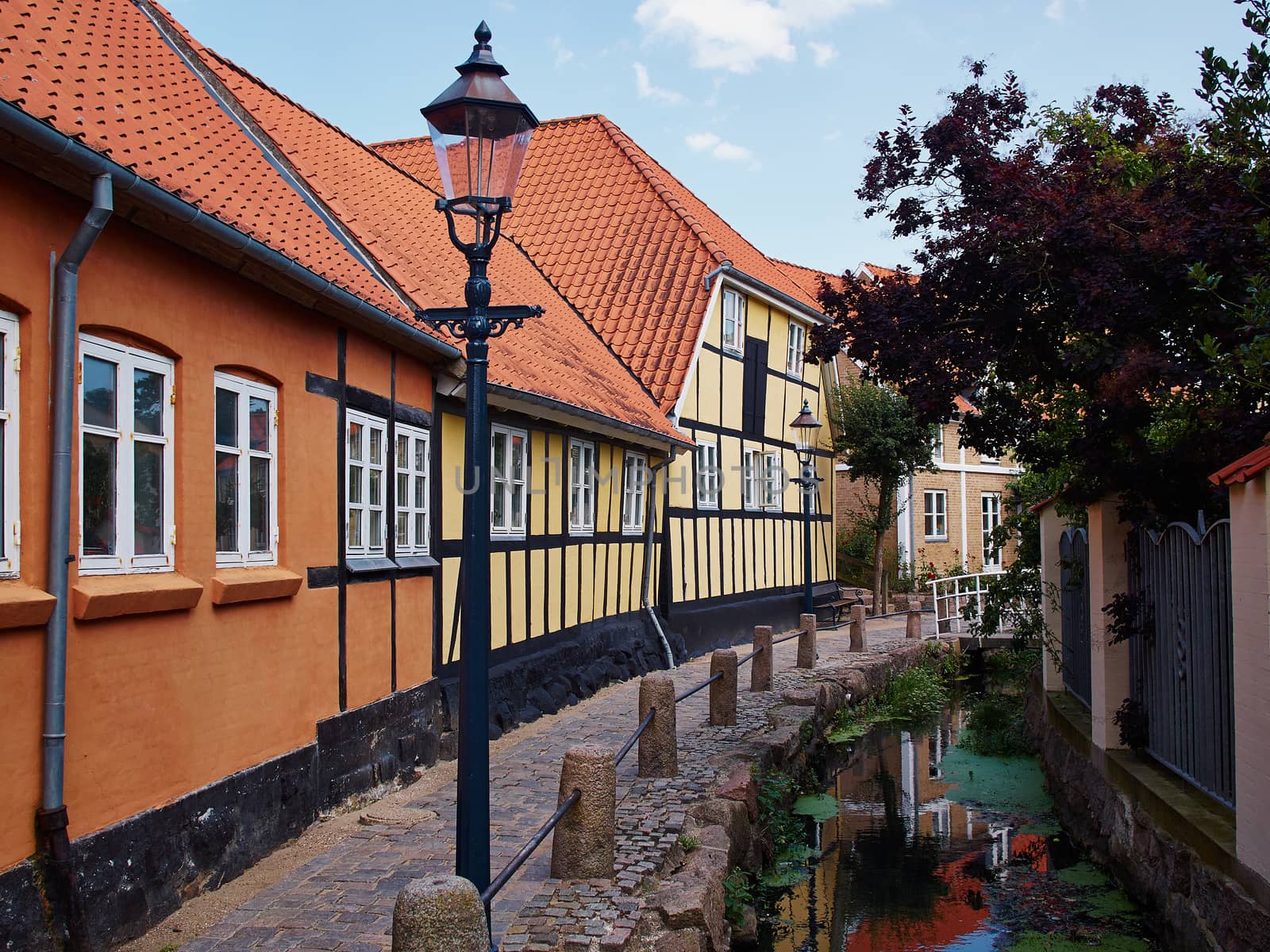 Typical small beutiful street with old traditional Danish style houses Bogense Denmark     