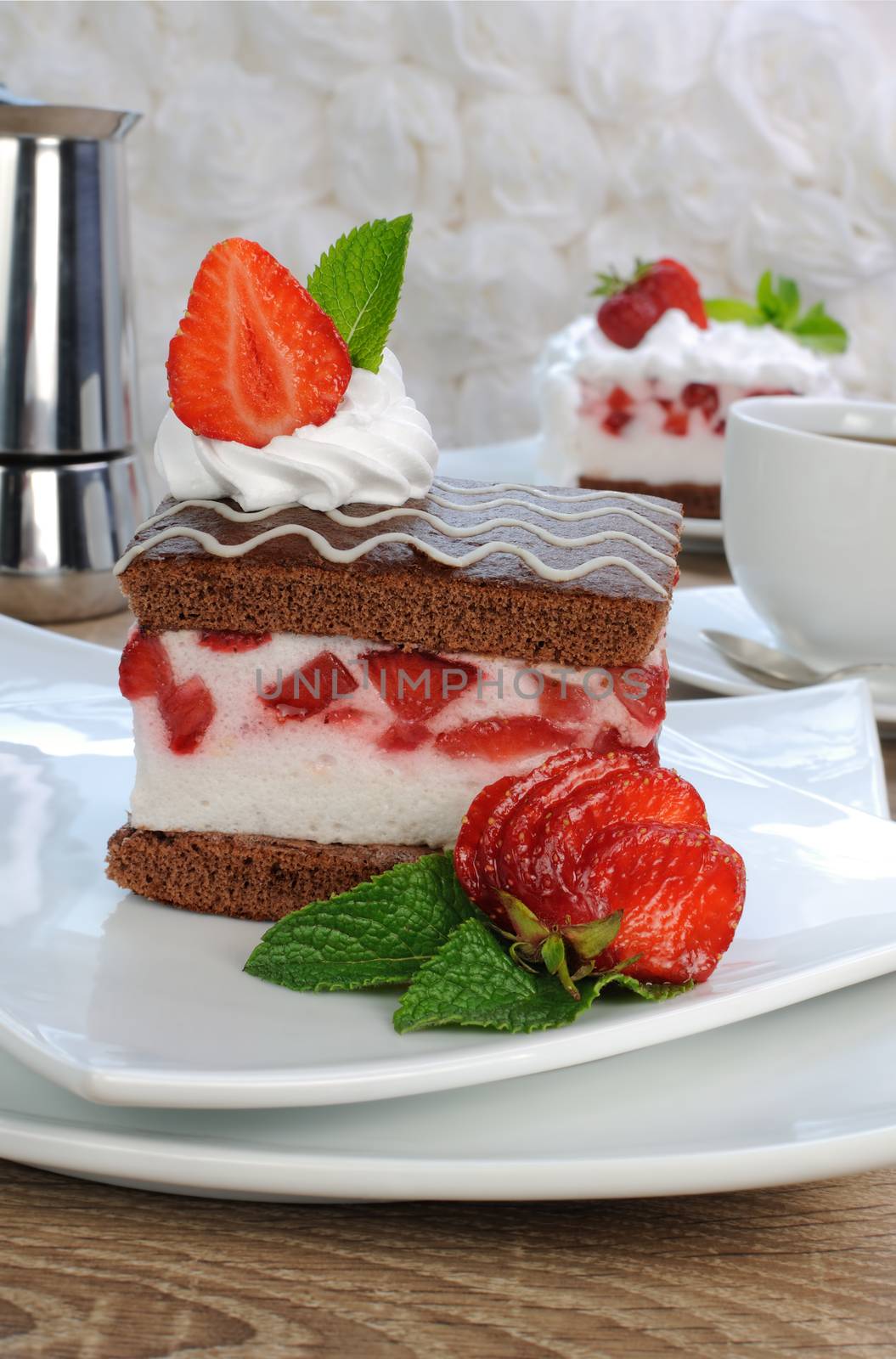 Strawberry souffle on a chocolate sponge cake 