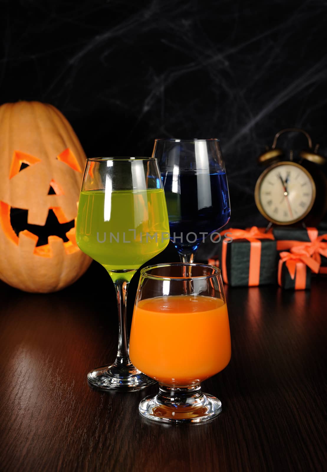 A variety of juices and drinks on the table in honor of Halloween