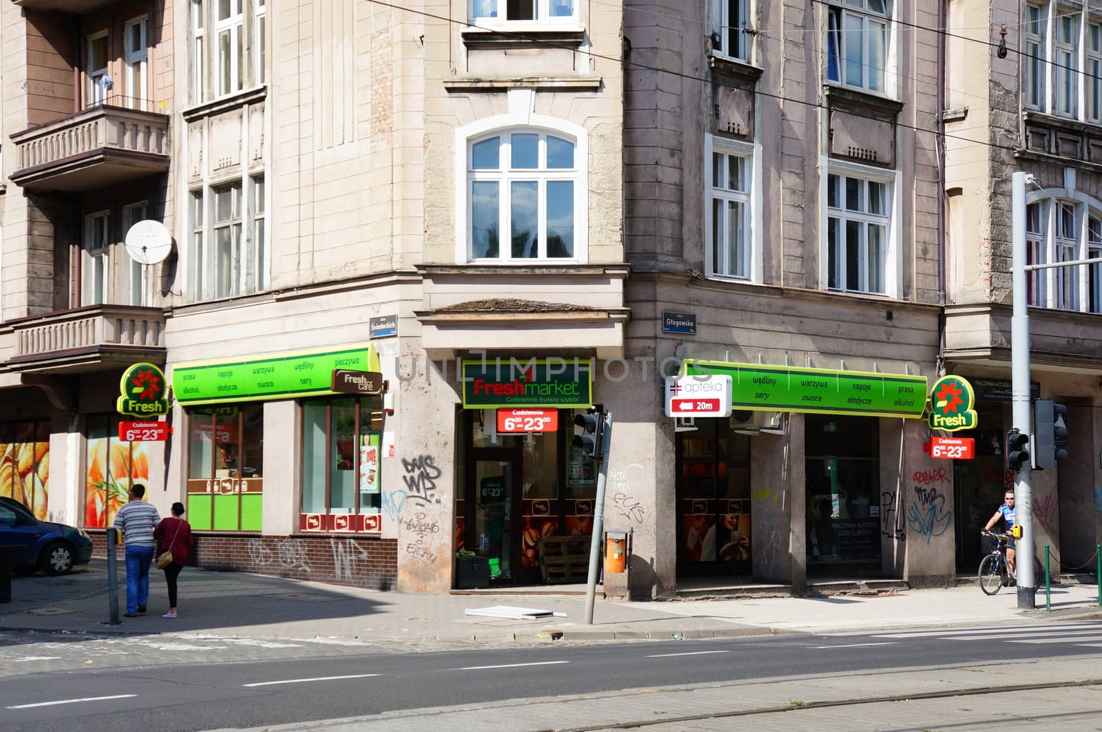 POZNAN, POLAND - AUGUST 25, 2013: Small store at a corner of the Glogowska street
