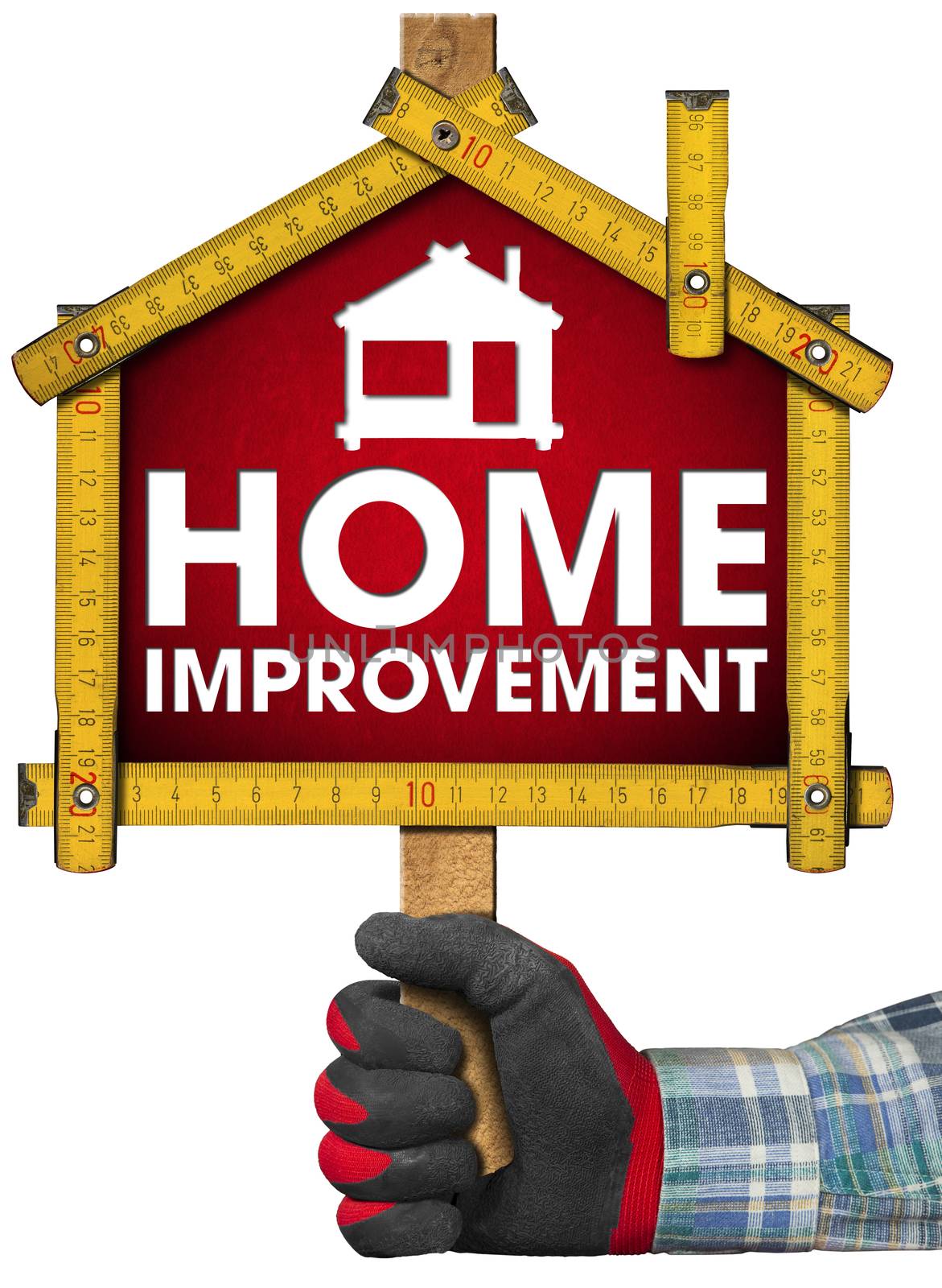 Hand with work glove holding a sign with a meter ruler in the shape of house with text Home Improvement. Isolated on white background