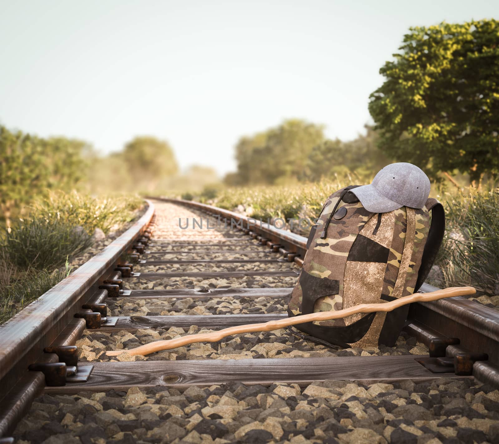 Railway track crossing rural landscape with travel backpack by denisgo