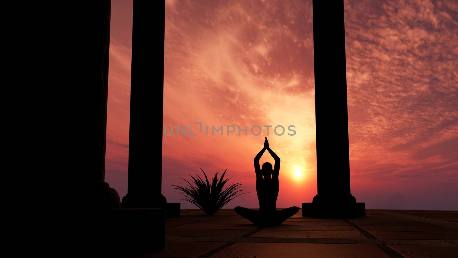 Silhouette practicing yoga at sunset