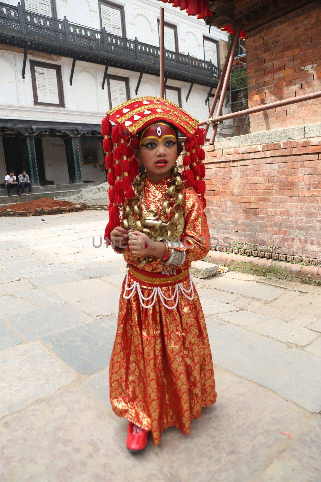NEPAL, Kathmandu: Little girls are prepped for the procession of Kumari Puja, a ritual performed on the eighth day during Durga Puja, in Kathmandu, Nepal on September 26, 2015.The girls are considered as incarnation of Goddess Durga.