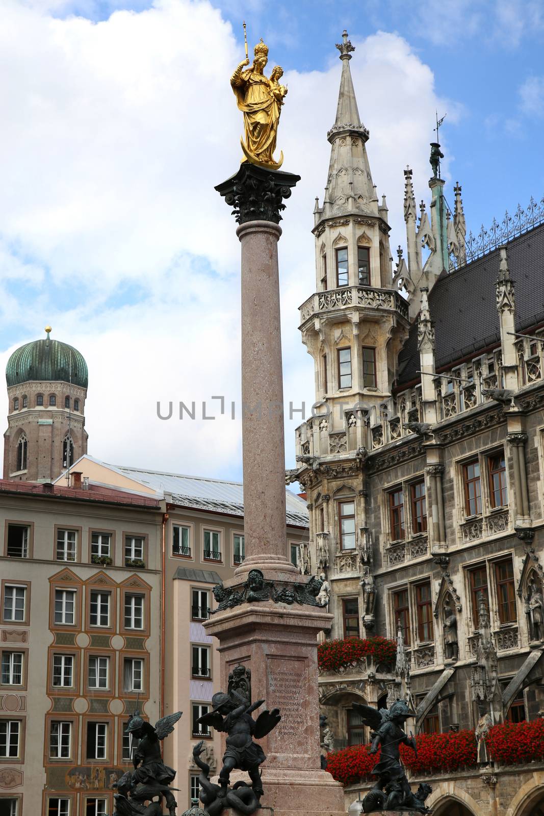 The Golden statue of Mary (Mariensaule), a Marian column on the Marienplatz in Munich, German