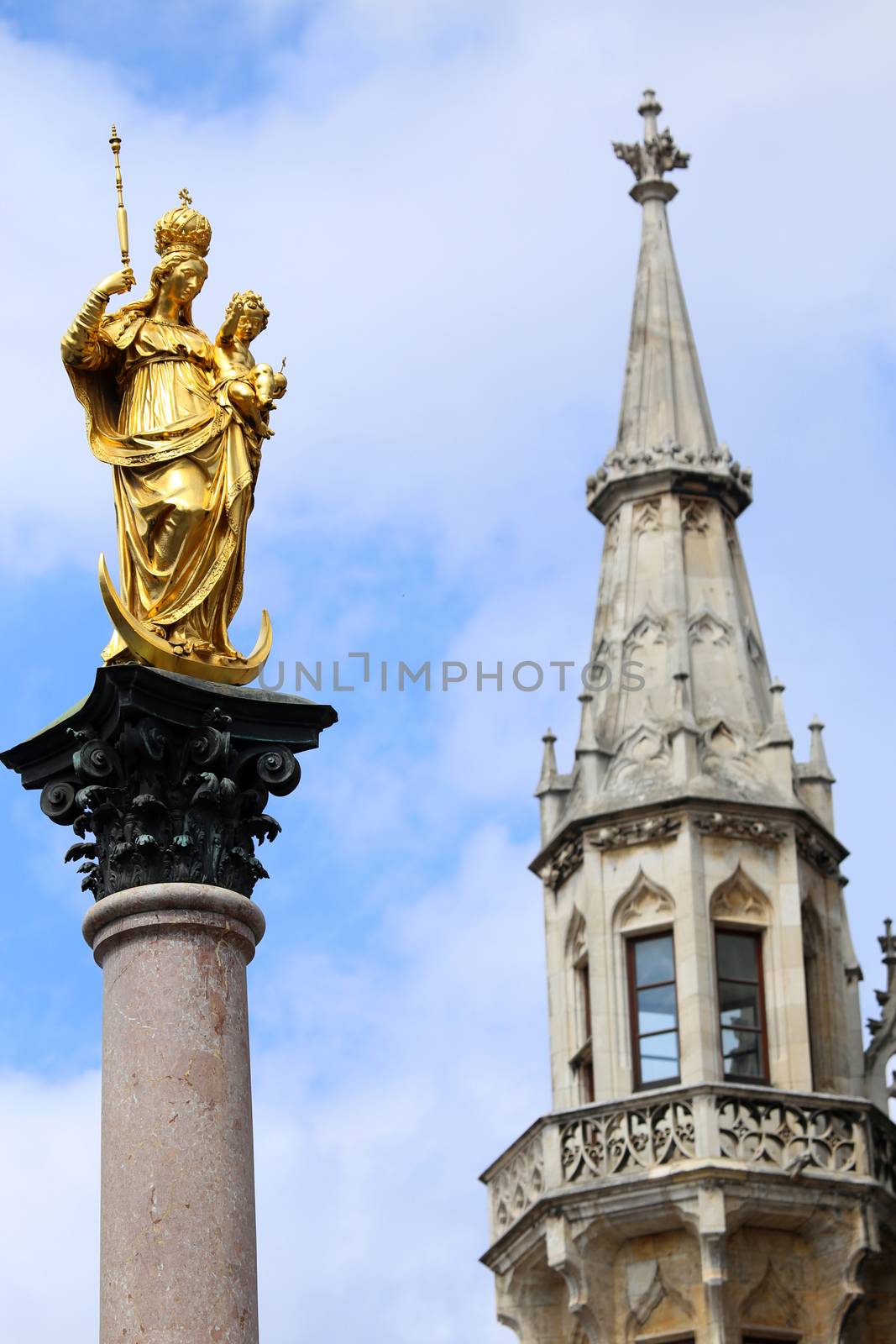 The Golden statue of Mary (Mariensaule), a Marian column on the Marienplatz in Munich, German