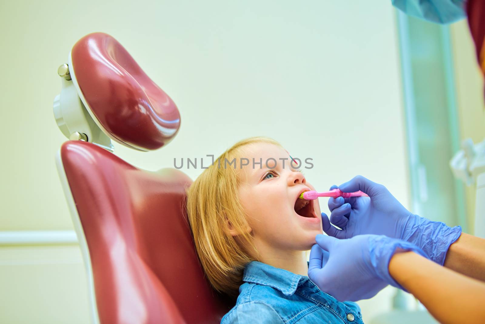 Little patient at the dentist office by sarymsakov
