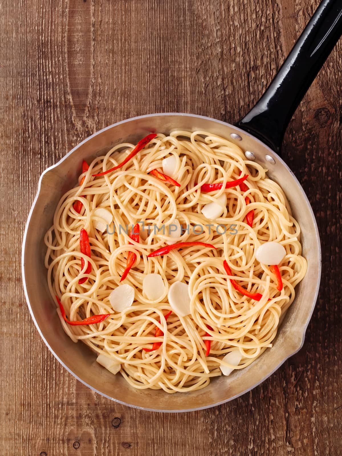 close up of rustic traditional italian aglio olio spaghetti pasta